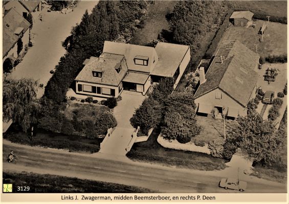 3129
Luchtfoto_van_drie_woningen
